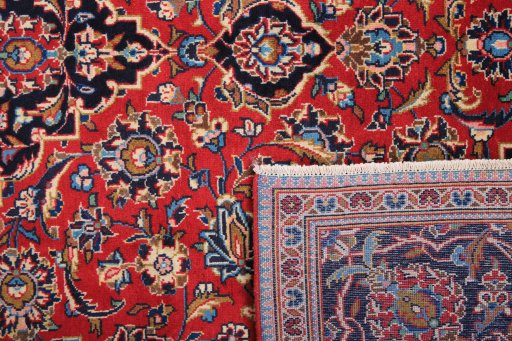 Full view of 2000s Kashan rug from Iran / Persia, 293 × 195 cm in Red tones