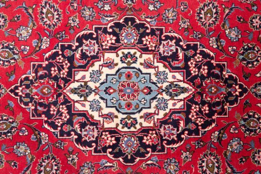 Full view of 1977s Kashan rug from Iran / Persia, 320 × 205 cm in Red tones