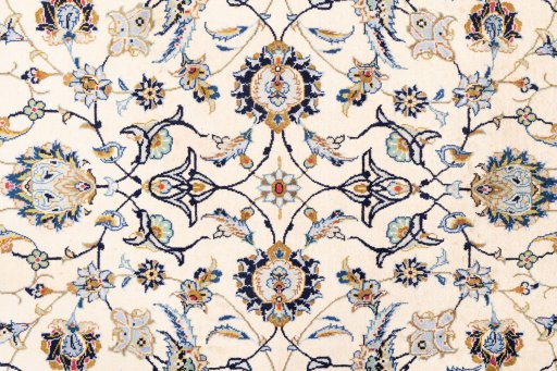 Corner detail of 1989s Kashan rug showing border pattern and Wool pile