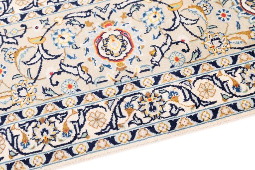 Backside of handmade 1989s Kashan rug showing knot structure and weave density