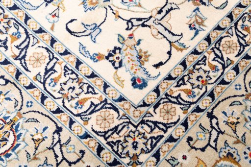 Close-up detail of 1989s Kashan rug from Iran / Persia showing Wool weave
