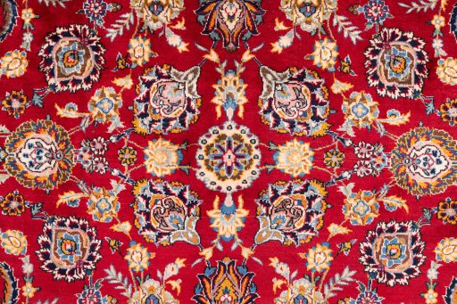Full view of 1980s Kashan rug from Iran / Persia, 443 × 335 cm in Red tones