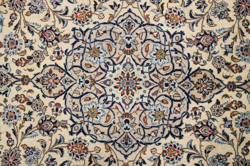Corner detail of 2000s Kashan rug showing border pattern and Wool pile