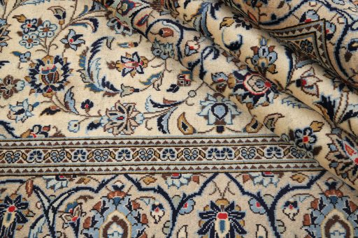 Close-up detail of 2000s Kashan rug from Iran / Persia showing Wool weave