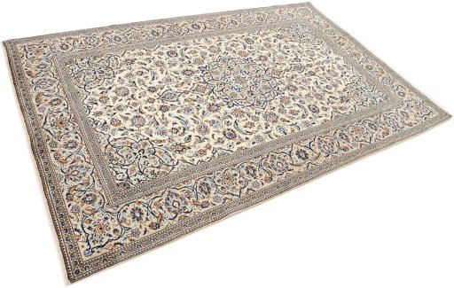 Corner detail of 2000s Kashan rug showing border pattern and Wool pile