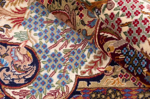 Close-up detail of 1975s Kashan rug from Iran / Persia showing Wool weave