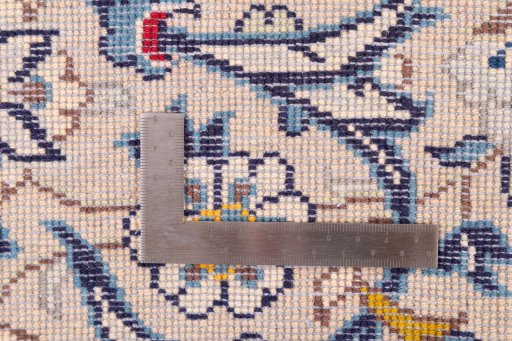 Close-up detail of 1983s Kashan rug from Iran / Persia showing Wool weave