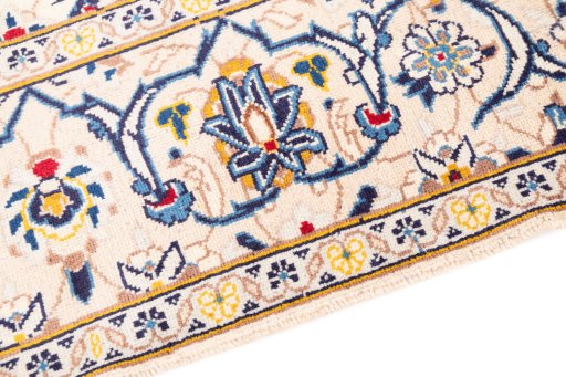 Backside of handmade 1983s Kashan rug showing knot structure and weave density
