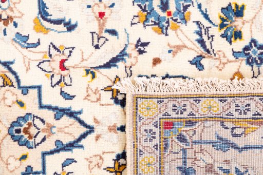 Close-up detail of 1983s Kashan rug from Iran / Persia showing Wool weave
