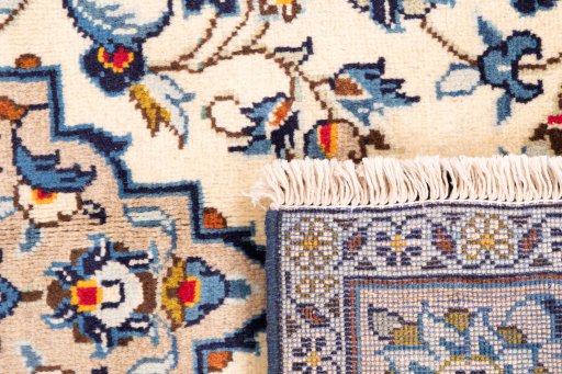 Close-up detail of 2000s Kashan rug from Iran / Persia showing Wool weave