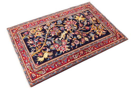 Close-up detail of 1980s Kashan rug from Iran / Persia showing Wool weave