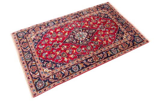 Close-up detail of 2000s Kashan rug from Iran / Persia showing Wool weave