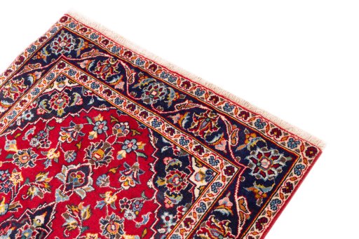 Surface texture of 2000s Kashan rug with natural Wool and intricate pattern