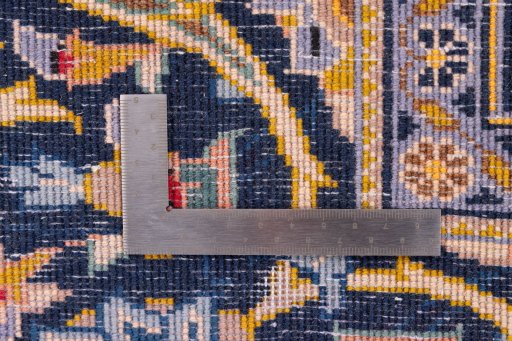 Close-up detail of 2003s Kashan rug from Iran / Persia showing Wool weave