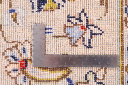 Close-up detail of 2003s Kashan rug from Iran / Persia showing Wool weave