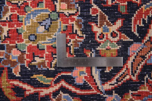 Surface texture of 1990s Kashan rug with natural Wool and intricate pattern