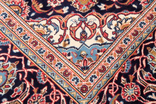 Close-up detail of 1975s Kashan rug from Iran / Persia showing Wool weave