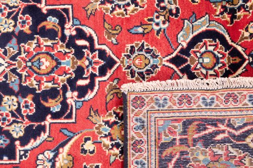 Full view of 1975s Kashan rug from Iran / Persia, 285 × 190 cm in Red tones