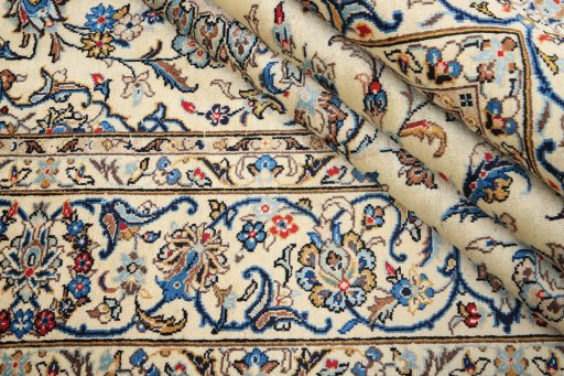 Close-up detail of 1985s Kashan rug from Iran / Persia showing Wool weave