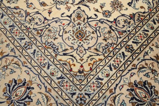 Corner detail of 1990s Kashan rug showing border pattern and Wool pile