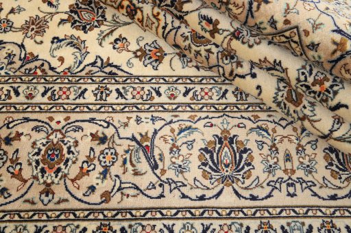 Close-up detail of 1990s Kashan rug from Iran / Persia showing Wool weave