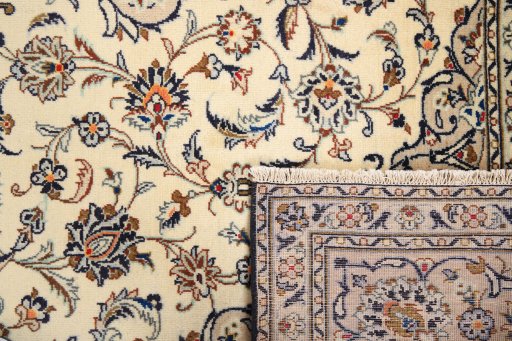 Close-up detail of 1990s Kashan rug from Iran / Persia showing Wool weave