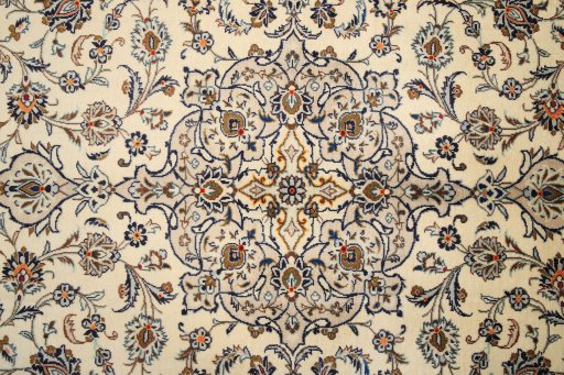 Full view of 1990s Kashan rug from Iran / Persia, 298 × 210 cm in Cream tones