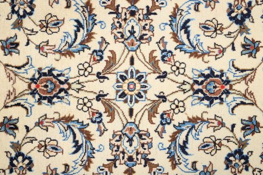 Corner detail of 2000s Kashan rug showing border pattern and Wool pile