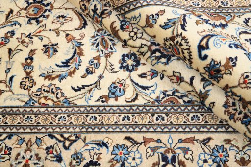 Close-up detail of 2000s Kashan rug from Iran / Persia showing Wool weave