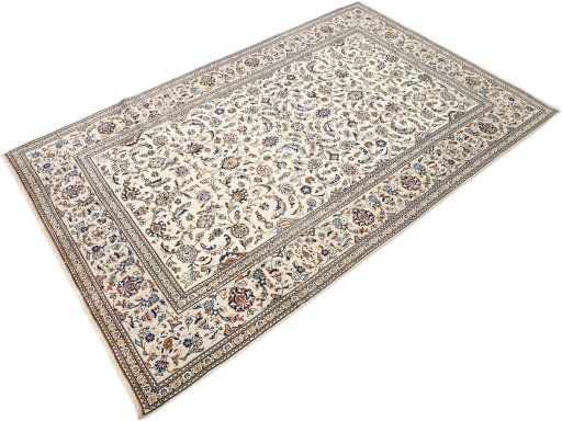 Corner detail of 2000s Kashan rug showing border pattern and Wool pile