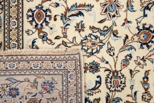 Full view of 2000s Kashan rug from Iran / Persia, 300 × 196 cm in Cream tones