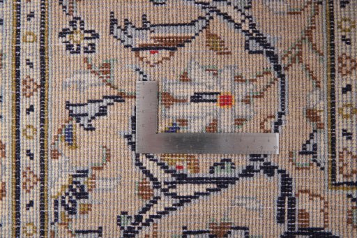 Close-up detail of 2000s Kashan rug from Iran / Persia showing Wool weave