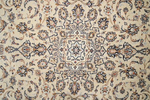 Full view of 2000s Kashan rug from Iran / Persia, 296 × 196 cm in Cream tones