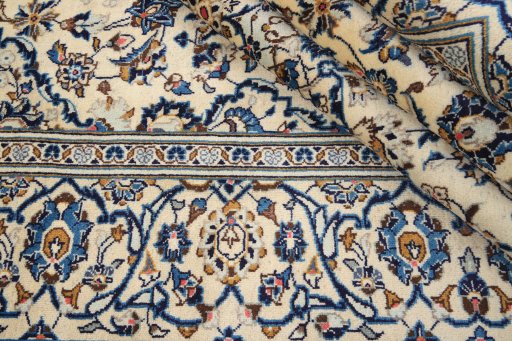 Close-up detail of 2000s Kashan rug from Iran / Persia showing Wool weave