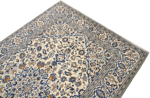 Surface texture of 2000s Kashan rug with natural Wool and intricate pattern
