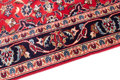 Backside of handmade 1996s Kashan rug showing knot structure and weave density