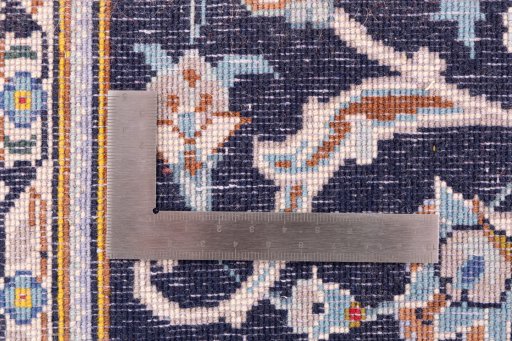 Corner detail of 1979s Kashan rug showing border pattern and Wool pile