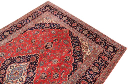 Surface texture of 2000s Kashan rug with natural Wool and intricate pattern