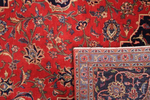 Full view of 2000s Kashan rug from Iran / Persia, 300 × 200 cm in Red tones