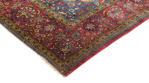 Backside of handmade 1920s Kashan rug showing knot structure and weave density