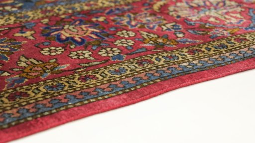 Central medallion detail of 1920s Kashan rug from Iran / Persia
