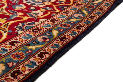 Close-up detail of 1990s Kashan rug from Iran / Persia showing Wool weave
