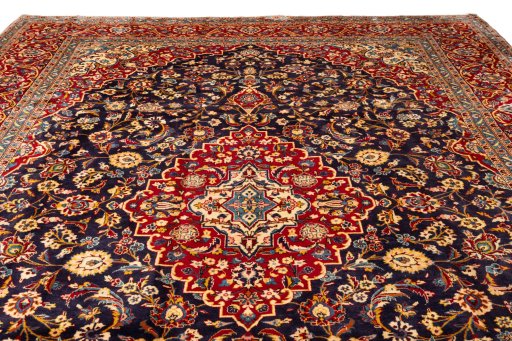 Full view of 1990s Kashan rug from Iran / Persia, 395 × 305 cm in Dark blue tones