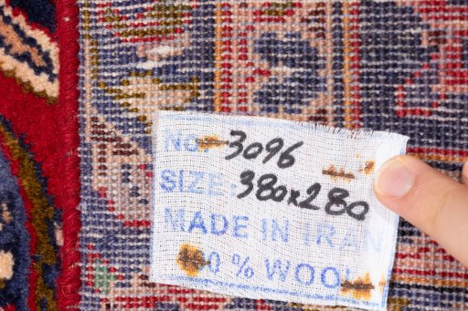 Close-up detail of 1990s Kashan rug from Iran / Persia showing Wool weave