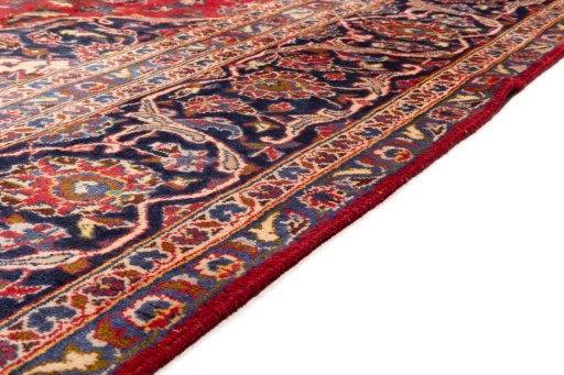 Close-up detail of 1990s Kashan rug from Iran / Persia showing Wool weave