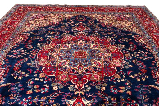 Full view of 1990s Kashan rug from Iran / Persia, 385 × 295 cm in Dark blue tones