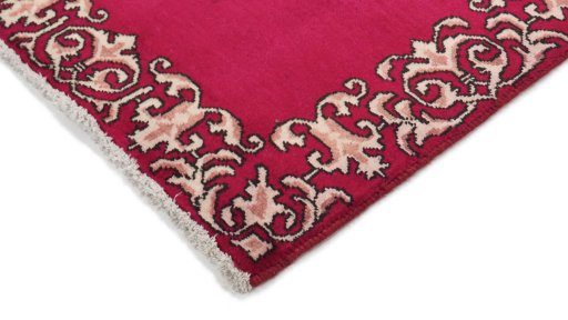 Backside of handmade 2000s Kashan rug showing knot structure and weave density