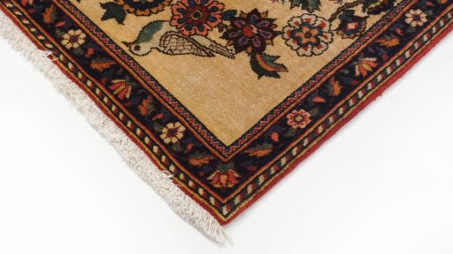 Backside of handmade 1960s Kashan rug showing knot structure and weave density