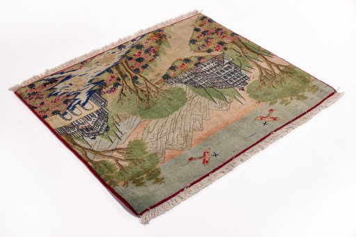 Corner detail of New Kashan rug showing border pattern and Wool pile