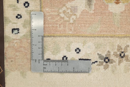 Corner detail of 1980s Kashmar rug showing border pattern and Wool pile